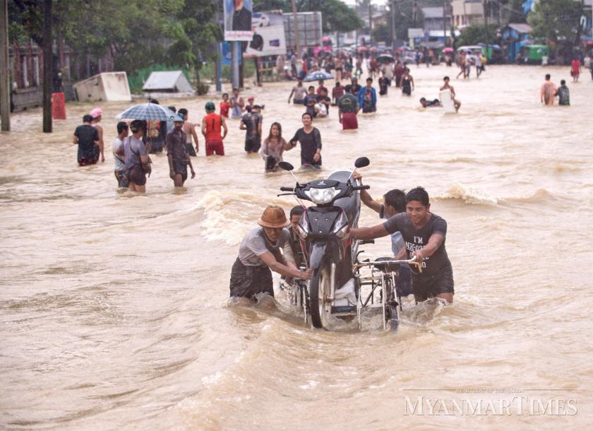 Five dead, nearly 100,000 displaced by Myanmar floods